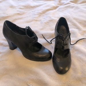 Black Born Lace Up Wingtip Heels